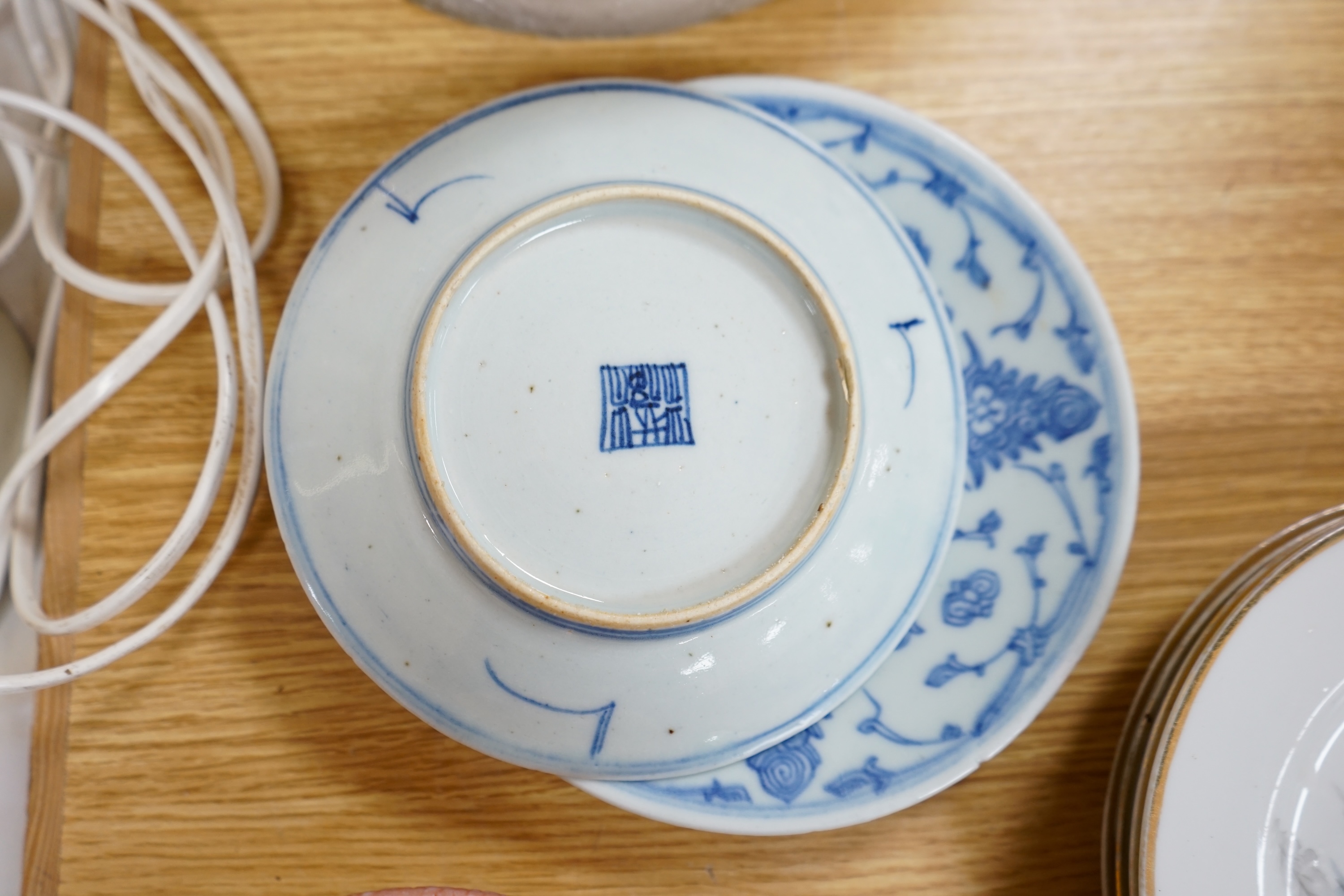 Two 19th century Chinese blue and white dishes together with a set of Japanese dishes, hand painted with storks, largest 19cm in diameter. Condition - fair to good